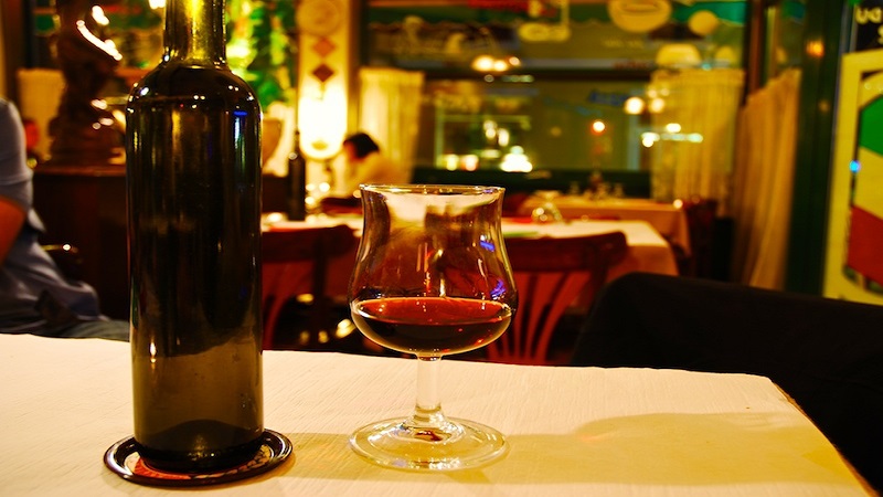 Image Showing A Bottle of Wine with Glass Placed on the Table