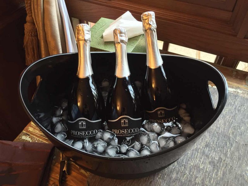 Image Showing Three Bottles of Wine Placed on a Bowl with Ice-cubes